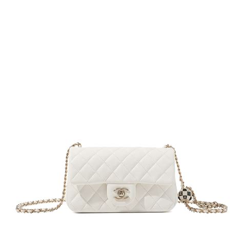 white quilted chanel bag gold chain|Chanel adjustable chain bag.